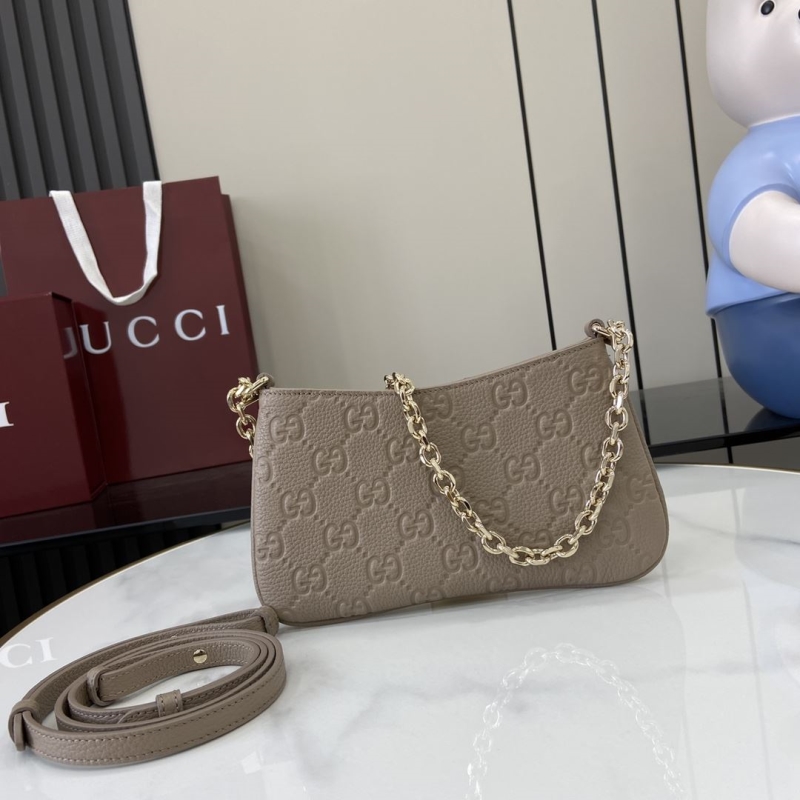 G*u*i satchel bags
